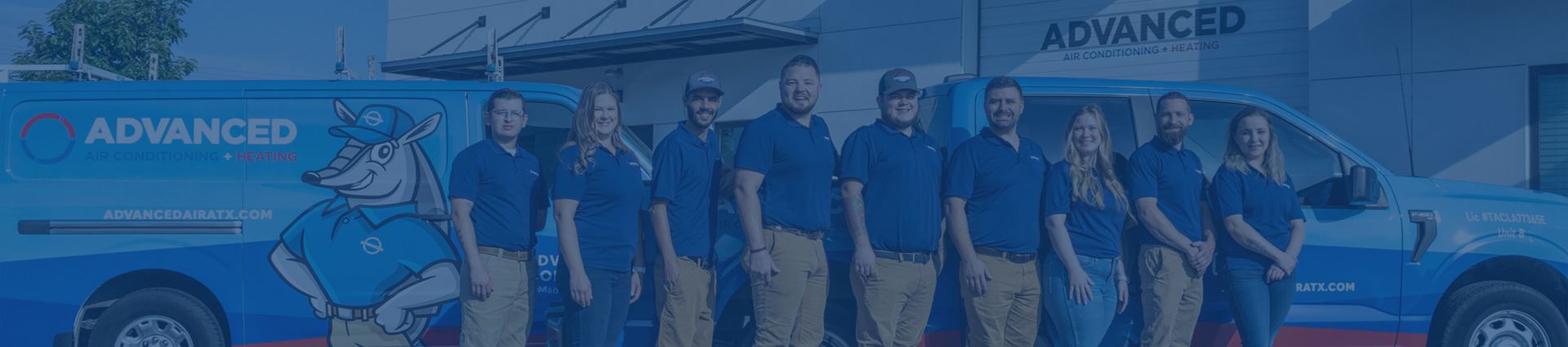 The full team at Advanced Air Conditioning and Heating standing in front of the company's branded blue van outside their Cedar Park, Texas shop